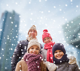 Image showing happy family in winter clothes outdoors