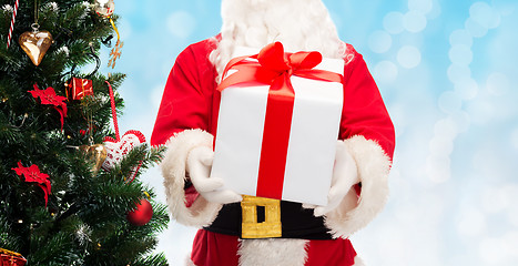 Image showing man in costume of santa claus with gift box