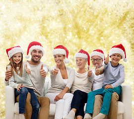 Image showing happy family sitting on couch