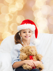 Image showing smiling little girl with teddy bear