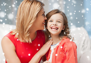 Image showing happy mother and girl whispering into ear