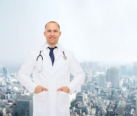 Image showing smiling male doctor with stethoscope