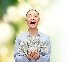 Image showing laughing businesswoman with dollar cash money