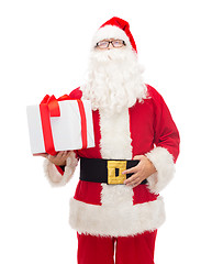 Image showing man in costume of santa claus with gift box