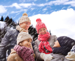 Image showing happy family in winter clothes outdoors