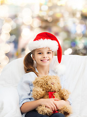 Image showing smiling little girl with teddy bear