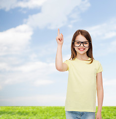 Image showing smiling cute little girl in black eyeglasses