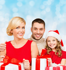 Image showing happy family with gift boxes