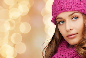 Image showing close up of smiling young woman in winter clothes