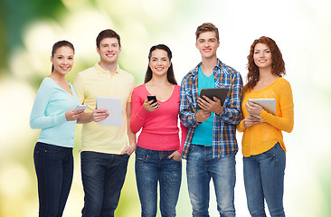 Image showing group of teenagers with smartphones and tablet pc