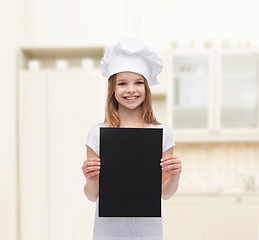 Image showing little cook or baker with blank black paper