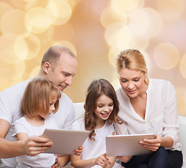 Image showing happy family with tablet pc computers