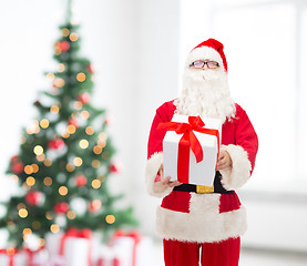 Image showing man in costume of santa claus with gift box