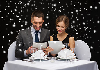 Image showing smiling couple at restaurant