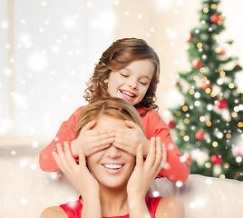 Image showing happy mother and daughter having fun at home