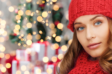 Image showing close up of smiling young woman in winter clothes