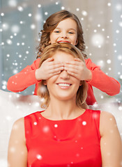 Image showing happy mother and daughter having fun at home