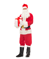 Image showing man in costume of santa claus with gift box