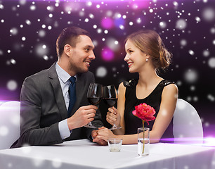 Image showing smiling couple at restaurant