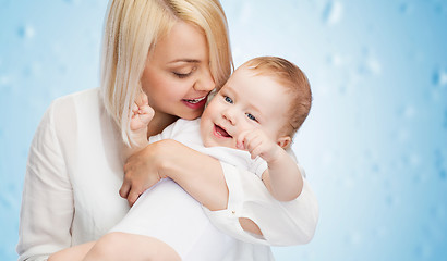 Image showing happy mother with smiling baby