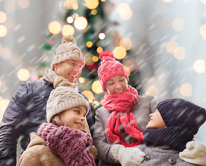 Image showing happy family in winter clothes outdoors