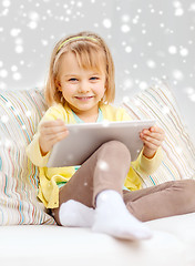 Image showing smiling girl with tablet pc computer at home