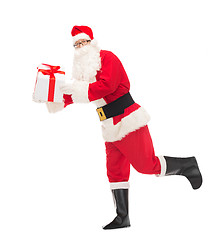 Image showing man in costume of santa claus with gift box