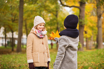 Image showing smiling children in autumn park