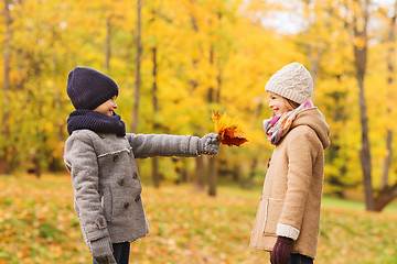 Image showing smiling children in autumn park