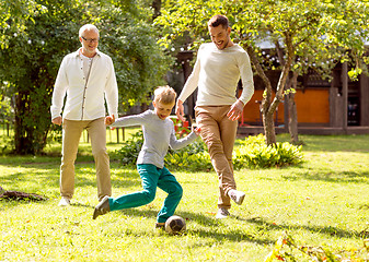 Image showing happy family playing football outdoors