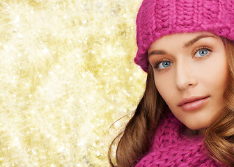 Image showing close up of smiling young woman in winter clothes