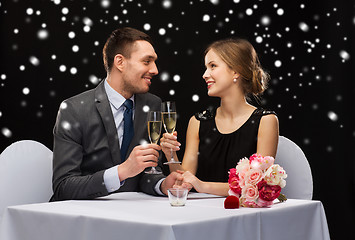 Image showing smiling couple at restaurant