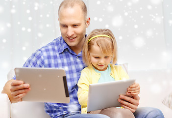 Image showing happy father and daughter with tablet pc computer