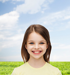 Image showing smiling little girl over white background