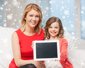 Image showing mother and daughter with tablet pc at home
