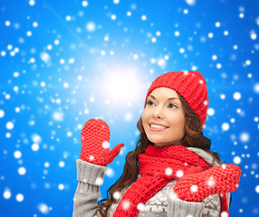 Image showing smiling young woman in winter clothes