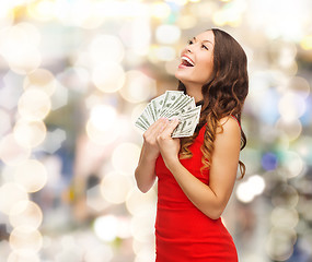 Image showing woman in red dress with us dollar money