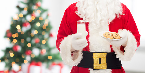 Image showing close up of santa claus with milk and cookies