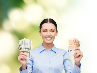 Image showing businesswoman with dollar cash money