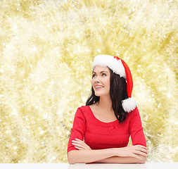 Image showing smiling woman in santa helper hat