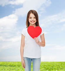 Image showing smiling little girl in white blank t-shirt