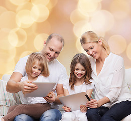 Image showing happy family with tablet pc computers