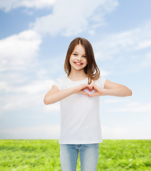 Image showing smiling little girl in white blank t-shirt