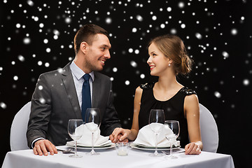 Image showing smiling couple at restaurant