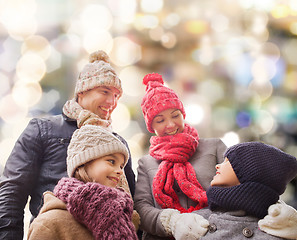 Image showing happy family in winter clothes outdoors