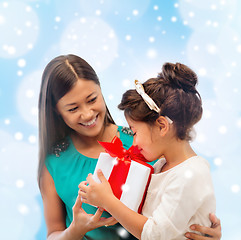 Image showing happy mother and child girl with gift box