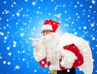 Image showing man in costume of santa claus with bag