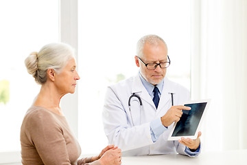 Image showing senior woman and doctor with tablet pc