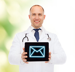 Image showing smiling male doctor with stethoscope and tablet pc