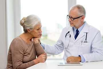 Image showing senior woman and doctor with tablet pc